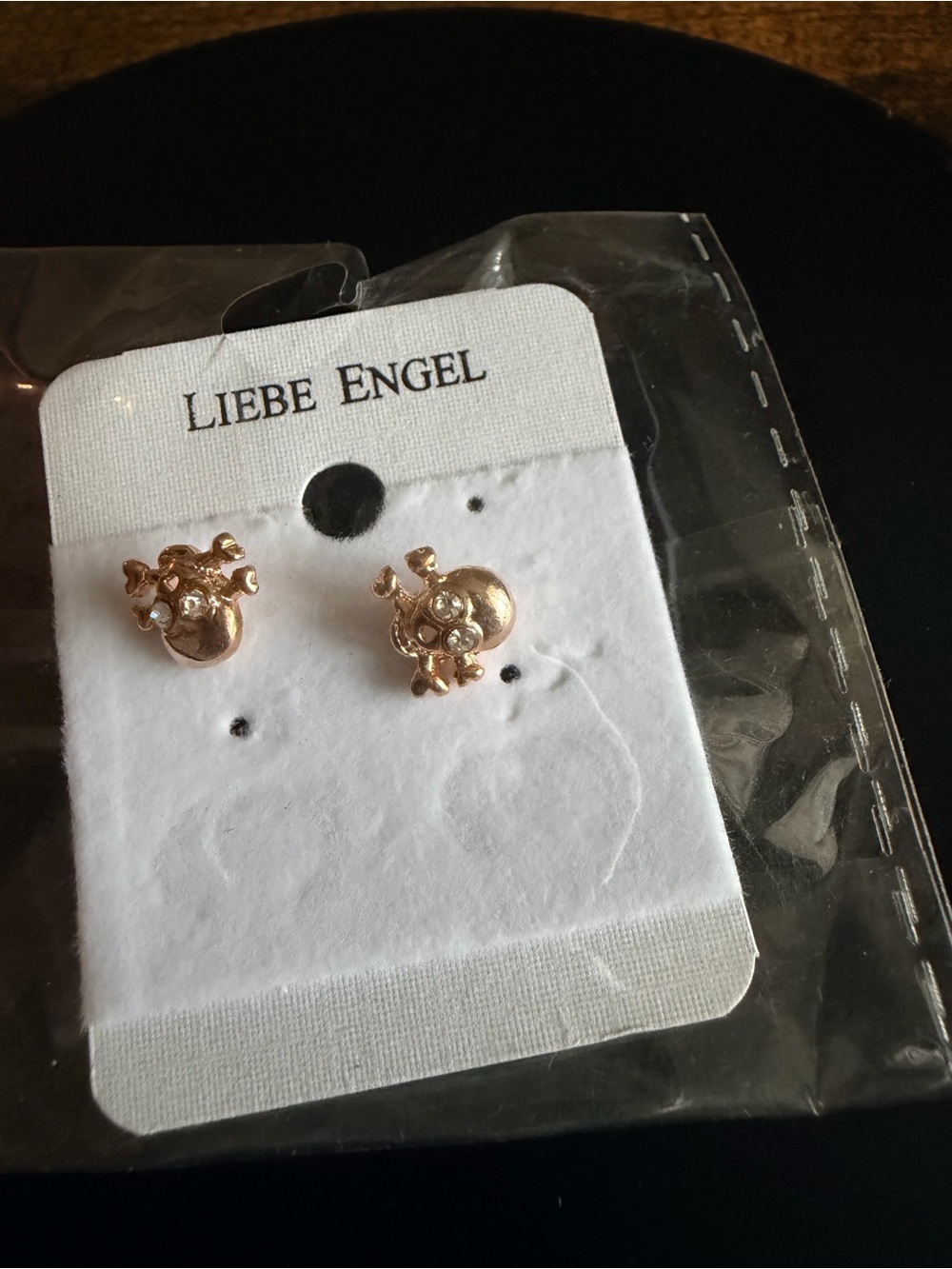 Rose Gold Skull and Cross Bones with Clear Rhinestone Accent Stud Earrings